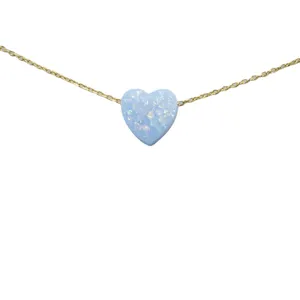 Chic gold chain necklace featuring a stunning light blue heart opal pendant for women daily wear.