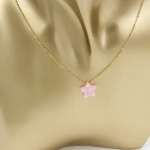 Exquisite pink resin opal star pendant necklace with golden stainless steel chain for women.