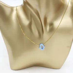 Gold dainty chain necklace with light blue resin hamsa hand pendant for women daily wear