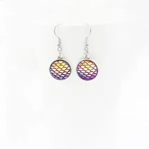 Mermaid scale resin stainless steel hook earrings detail, colorful fish scale pattern.