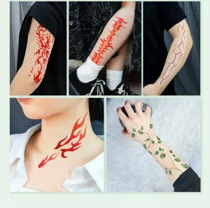 Detailed view of waterproof temporary tattoo stickers featuring flame, lightning, and leaf vine designs.