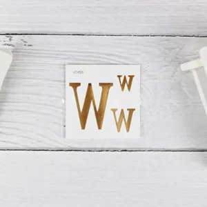 Waterproof metallic gold letter W temporary tattoo sticker for party and festival decoration.