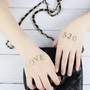 Metallic gold temporary tattoo stickers for hands, waterproof fashion body art for party.