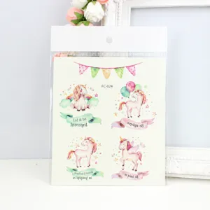 Waterproof cute unicorn temporary tattoo sticker sheet for kids, colorful cartoon body art designs.
