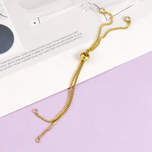 Exquisite titanium steel slider bolo bracelet detail with sparkling zirconia ends and box chain.