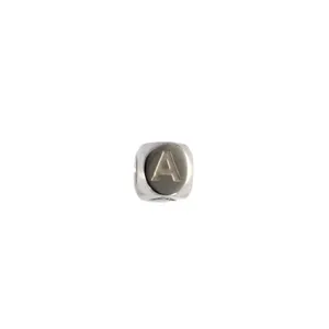 Stainless steel letter cube bead detail shot, engraved initial A charm for DIY jewelry making.