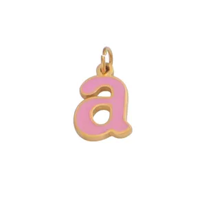 Close-up shot of pink enamel letter a pendant, gold-edged DIY jewelry accessory.