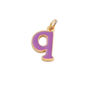 Close-up detail of the gold-rimmed purple enamel letter q pendant, smooth shiny finish.