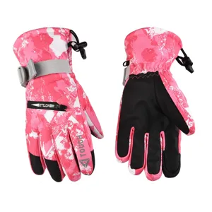 Pink camouflage ski gloves detail view, waterproof and windproof winter outdoor sports gloves.