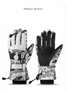 Winter ski gloves detail showing black and white graffiti print and thermal lining.