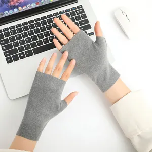 Grey fingerless thermal gloves detail view, soft stretch fabric showing fine knitting texture.