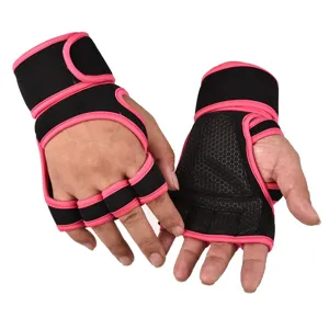 Close-up detail of black and pink gym fitness gloves featuring extended wrist wrap and palm.