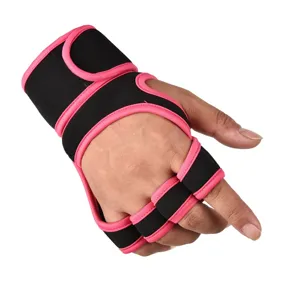 Detail shot of black and pink fitness wrist wrap palm support glove for gym training.