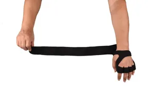 Detailed view of the black fitness wrist wrap and palm support with adjustable strap design.
