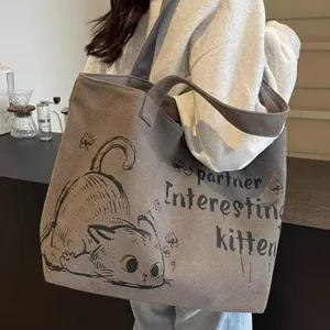 Casual large capacity canvas tote bag detail view, brown kitten print shoulder shopping bag.