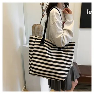 Black and white striped canvas tote bag, large capacity casual shoulder bag for daily use.