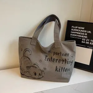 Casual large capacity canvas tote bag for women, stylish daily commuter single shoulder shopping bag.