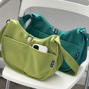 Casual nylon hobo shoulder bag for women, minimalist daily crossbody bag with front pocket.