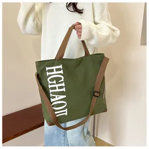 Grand sac cabas en toile pour femme fourre-tout décontracté avec sangle réglable et texte.