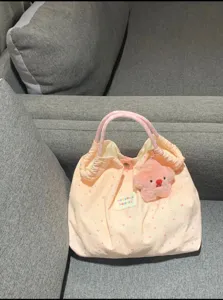 Cute pink canvas tote bag with check handles and star plush pendant for daily commute student use