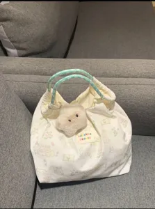 Cute canvas tote bag with rabbit print, large capacity commuter handbag for women and students.