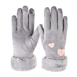 Women winter touch screen suede gloves with warm furry cuffs and cute pink heart details.