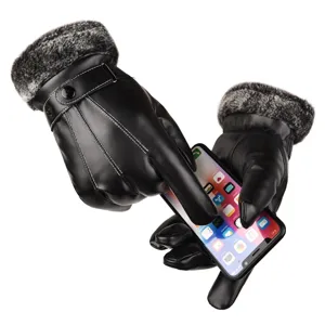 Close-up detail view of men's winter warm black leather touchscreen gloves with plush fur cuffs.