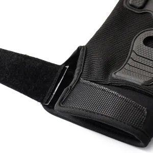 Black tactical half-finger gloves with protective knuckle armor and adjustable velcro wrist strap.