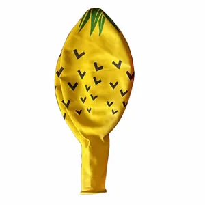Giant 36-inch yellow pineapple latex balloon detail, festive party decoration display.