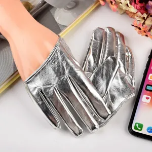 Silver metallic PU gloves detail shot, women full finger shiny performance gloves for party.