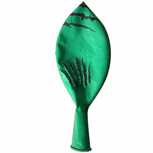 Green leaf shaped balloon with black claw marks, perfect for party and holiday decor.