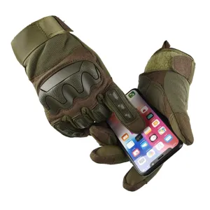 Tactical gloves detail view showing touchscreen compatibility and hard knuckle protection design.