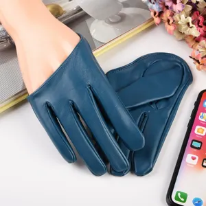 Close-up detail of women's blue PU leather full-finger gloves for stage performance.