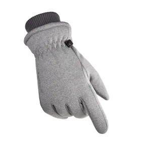 Men's thermal winter ski gloves detail view, fleece lined waterproof windproof sports gear.