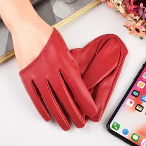 Women red PU leather full finger gloves for stage performance nightclub fashion party wear.