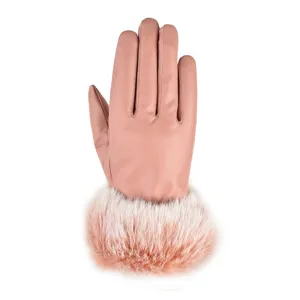 Detail view of women winter warm PU leather gloves with soft fluffy fur cuff design.