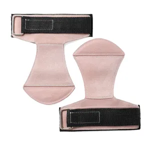 Primer plano de almohadillas de cuero rosa para levantamiento con correas de velcro ajust.
