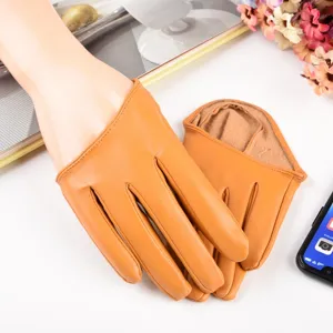 Women orange full finger PU gloves for stage dance nightclub performance and party wear.