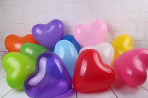Colorful heart latex balloons set for wedding room and party decoration detail view.