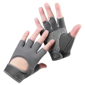 Detailed view of grey half-finger fitness gloves showing breathable mesh and anti-slip grip.