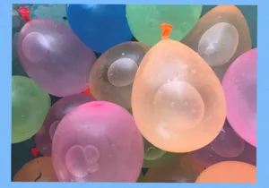 Colorful water balloons set for summer outdoor fun, quick filling water fight party toy for kids.