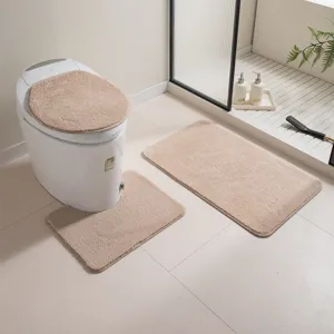 Beige Plüsch Toilettenmatten 3-teilig, weiche saugfähige Badematte und WC-Deckelbezug.