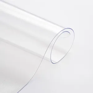 Clear waterproof PVC tablecloth protector, transparent plastic table mat roll for home use.