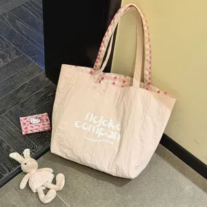 Korean style large capacity canvas shoulder tote bag with cute wave pattern and pink design.