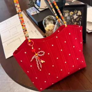 Korean style red floral canvas tote bag with colorful beaded shoulder strap and cute bow pendant.