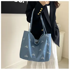 Casual blue denim tote bag with white bow pattern, large capacity daily shoulder bag for women