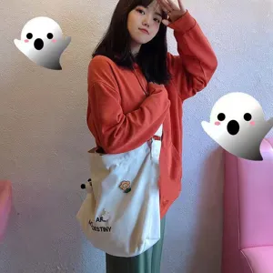 Large capacity casual canvas tote bag with stylish letter print for women daily commuting.