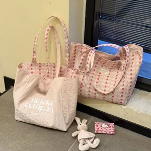 Pink wavy dot canvas tote bag, large capacity casual shoulder bag for women detail view.