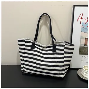 Classic black and white striped canvas tote bag, large capacity casual commuter handbag.