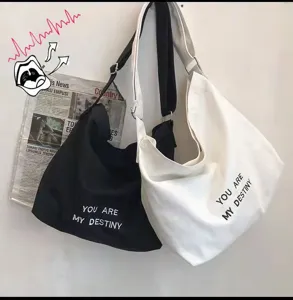 Casual canvas tote bag with large capacity, stylish Korean style shoulder messenger bag for women.